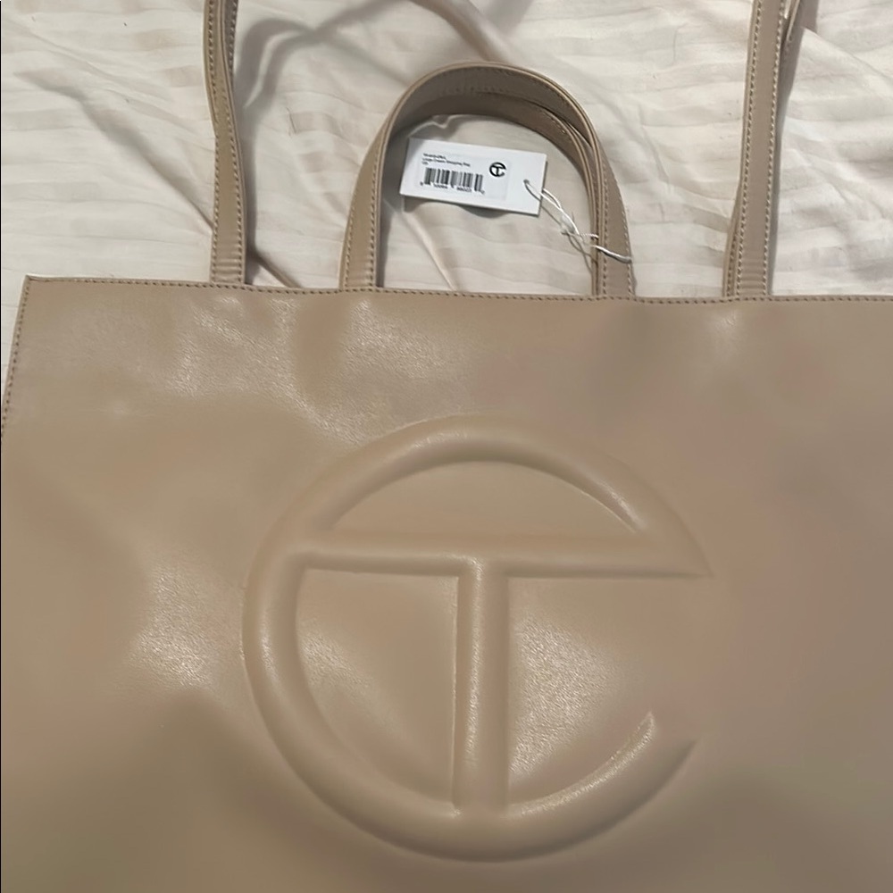 Telfar Tan Tote Bag with Embossed Logo and Structured Shape